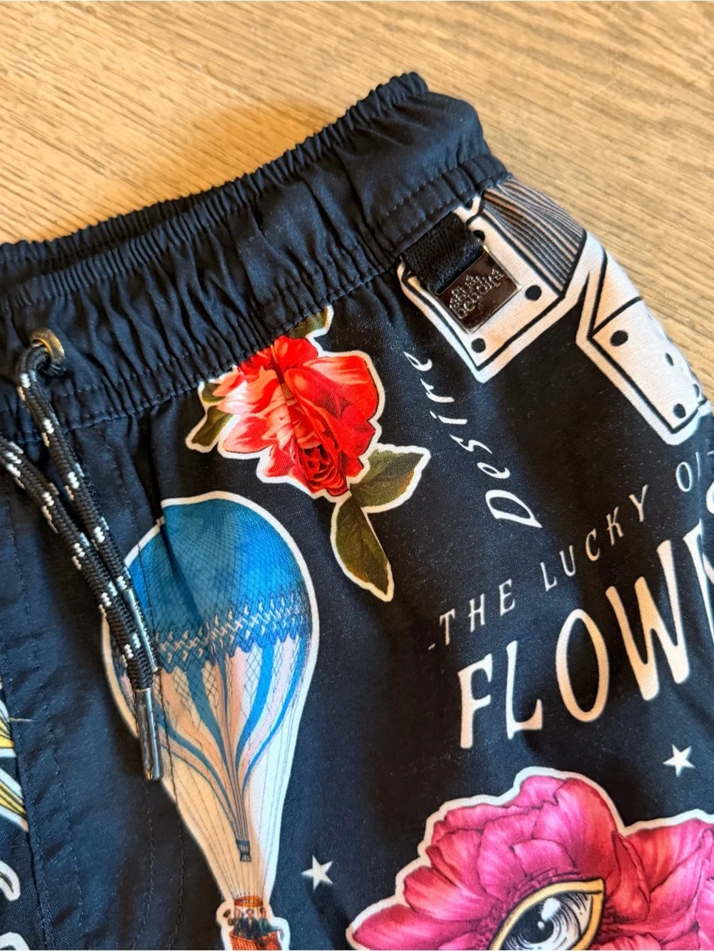 Agua Bendita Black Kids Swim Trunks with Multicolor Graphic Prints